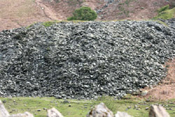 Jumbled waste tipped from the dressing floor above